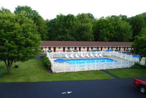 an aerial view of a building with a pool at Fran Cove Motel in Lake George