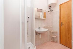 Koupelna v ubytování Apartment Slavko