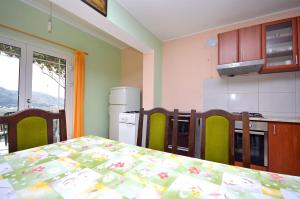 Kuchyň nebo kuchyňský kout v ubytování Apartments Kata