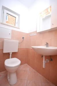 Koupelna v ubytování Apartments Kata
