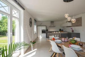 Η κουζίνα ή μικρή κουζίνα στο Ô Gris Cottage +25 φωτογραφίες