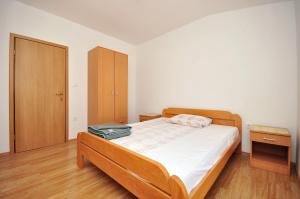 Postel nebo postele na pokoji v ubytování Apartments Renato
