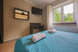 Postel nebo postele na pokoji v ubytování B&M Guesthouse