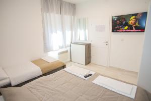 Postel nebo postele na pokoji v ubytování Apartment Primorska