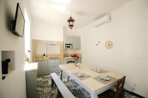 Kuchyň nebo kuchyňský kout v ubytování Villas de Cintra