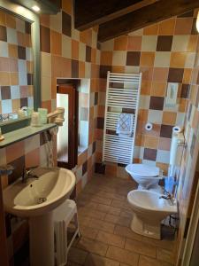 Koupelna v ubytování Hotel Piccolo Parco