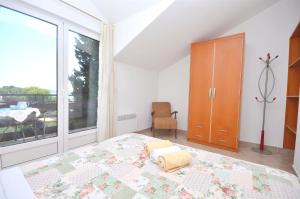Posteľ alebo postele v izbe v ubytovaní Apartments Brankaa