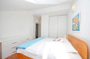 Posteľ alebo postele v izbe v ubytovaní Apartments Brankaa