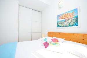 Posteľ alebo postele v izbe v ubytovaní Apartments Brankaa