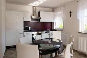 Kuchyňa alebo kuchynka v ubytovaní Ferienhaus Bucic