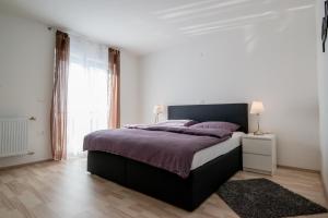 Posteľ alebo postele v izbe v ubytovaní Ferienhaus Bucic