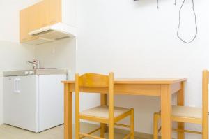 Kuchyň nebo kuchyňský kout v ubytování Apartments Tiho i Pave