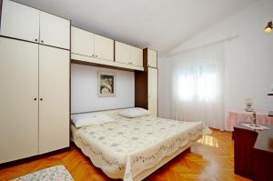 Postel nebo postele na pokoji v ubytování Apartment Ksenija
