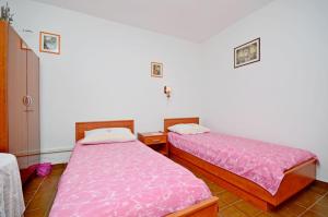 Postel nebo postele na pokoji v ubytování Apartment Ksenija