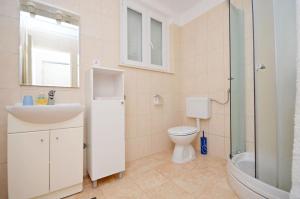 Koupelna v ubytování Apartment Ksenija