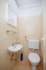 Koupelna v ubytování Apartment Ksenija