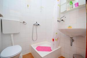 Koupelna v ubytování Apartment Ksenija