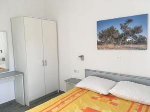 Postel nebo postele na pokoji v ubytování Apartments Suzana