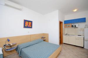 Kuchyň nebo kuchyňský kout v ubytování Apartments Jure