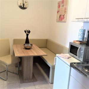 Kuchyň nebo kuchyňský kout v ubytování Apartments Marjan