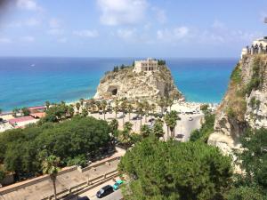 a view of the amalfi coast with a castle on a mountain at B&B Hortis Tropea in Tropea