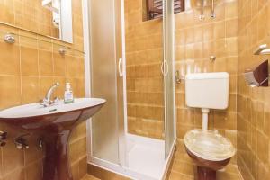 Kúpeľňa v ubytovaní Apartment Zorka + 12 fotografií