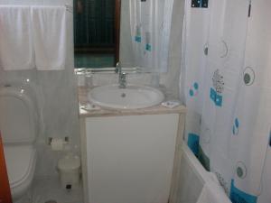 Koupelna v ubytování Hotel Conforto Latino