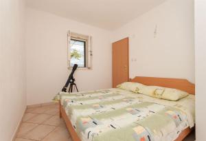 Ένα ή περισσότερα κρεβάτια σε δωμάτιο στο House Vela Lozna