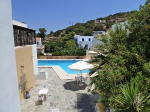 a view of a pool from a building at Porfyris Hotel in Mandrákion