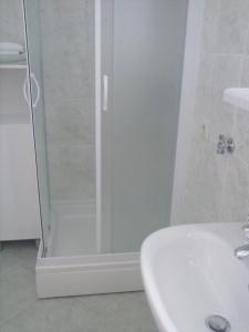 Koupelna v ubytování Apartments Mara