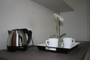 Coffee and tea making facilities at Appartamenti Emilio