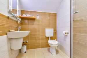 Kúpeľňa v ubytovaní Apartments Arsen