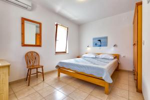 Posteľ alebo postele v izbe v ubytovaní Apartments Arsen