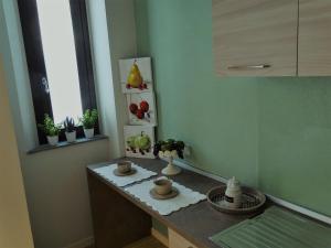 A kitchen or kitchenette at Appartamenti Emilio