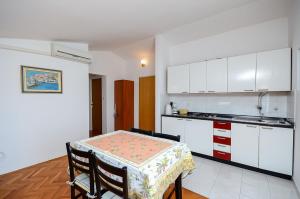Kuchyň nebo kuchyňský kout v ubytování Apartments Dragica