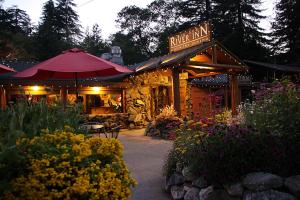 a restaurant with a sign that reads pizza inn at Big Sur River Inn in Big Sur +21 photos