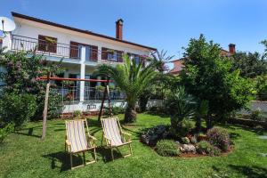 Vonkajšia záhrada v ubytovaní Apartments Patricia