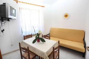 Telewizja i/lub zestaw kina domowego w obiekcie Apartments Patricia