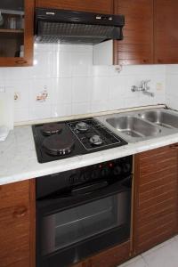 Kuchnia lub aneks kuchenny w obiekcie Apartments Patricia