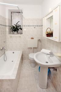 Kúpeľňa v ubytovaní Apartments Patricia + 37 fotografií