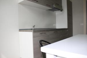 A kitchen or kitchenette at Appartamenti Emilio