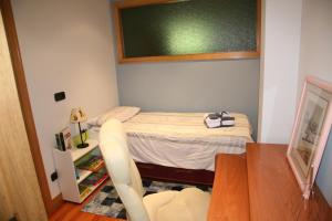 A bed or beds in a room at AnaKlara en Azkoitia
