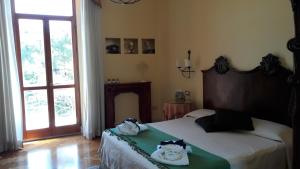 Postel nebo postele na pokoji v ubytování B&B Casa Laviano