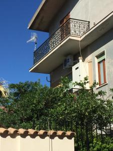 a balcony on the side of a building at Calabria Mare Ionio - La Casa di Anna - Siderno Marina in Siderno Marina