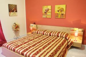 Ένα ή περισσότερα κρεβάτια σε δωμάτιο στο Vesuvio Bed & Breakfast