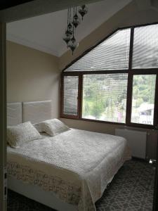 Кровать или кровати в номере Hamsikoy Hotel