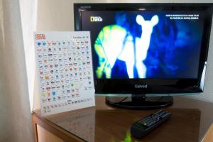 TV a/nebo společenská místnost v ubytování Hotel Córdoba Centro
