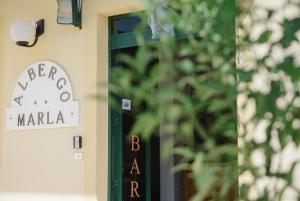 Certifikát, hodnocení, plakát nebo jiný dokument vystavený v ubytování Albergo Marla