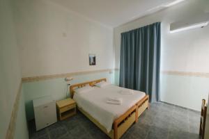 Postel nebo postele na pokoji v ubytování Albergo Marla