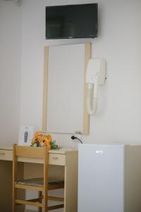Kuchyň nebo kuchyňský kout v ubytování Albergo Marla